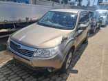 A picture of subaru forester gold