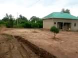 A picture of CHEAP PLOTS All installments allowed In Kanyanda Matugga along Semuto
