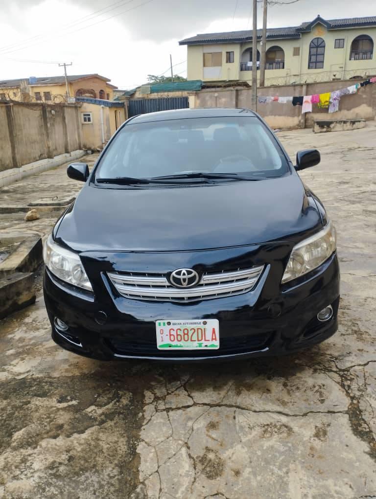 A picture of Toyota Corolla 2010 BUY AND TRAVEL ENGINE AND GEAR AC