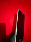 A picture of Samsung j5 prime. Mpya ila ina kreki chache hapo juu