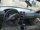 A picture of Mazda FIRSTBODY Price 490k Dm or Call 09068030011 Beautiful in