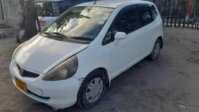 A picture of Honda Fit cc 1290 Gari full ac Gari safari popote