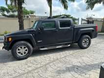 A picture of STILL AVAILABLE 09 BULLETPROOF Hummer H3T Pickup Price 25M with