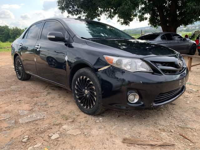 A picture of Distress 2011 Toyota Corolla buy and drive going for 5m