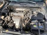 A picture of Partly first body Toyota Camry 2002 with a sound engine