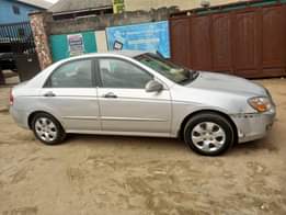 A picture of 2008 KIA CERATO SOUND ENGINE SHARP GEAR CHILLING AC COMPLETE