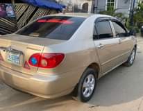 A picture of Toyota corolla 2006 Gold Colour blue Condition Nigerian Used pure