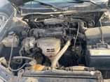A picture of Toyota Camry year 2001 sound engine and gear AC first