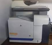 A picture of HP laserjet cm3530 fs printer 3in1