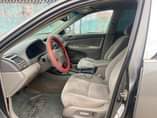 A picture of Toyota Camry 2004 with Tokunbo Engine AC chilling Gear selecting
