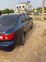 A picture of Sharp Toyota Corolla 2006 on belt