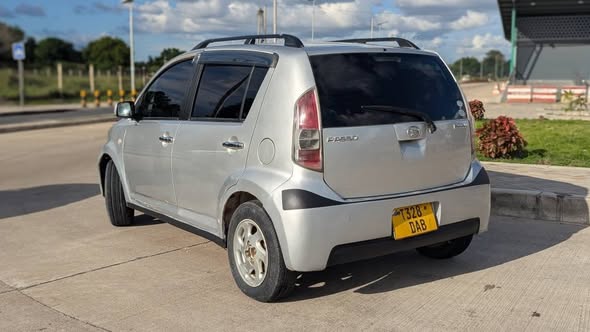 A picture of TOYOTA PASSO FULL DOCUMENT FULL AC CC 990 BEI 4