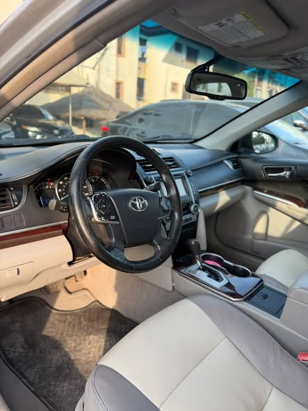 A picture of CLEAN FOREIGN USED 2013 TOYOTA CAMRY XLE IN PRISTINE CONDITION