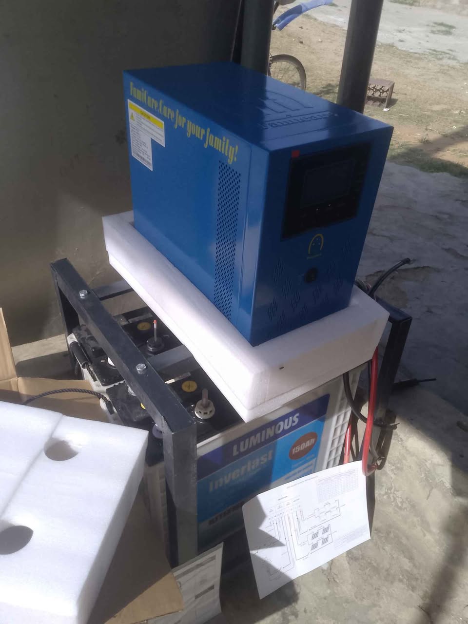 A picture of 3 5kva 24v inverter with 2 fairly tubular Batteries and