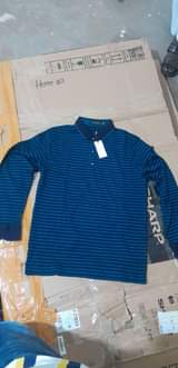 A picture of Fashionable t shirts and Shot trousers