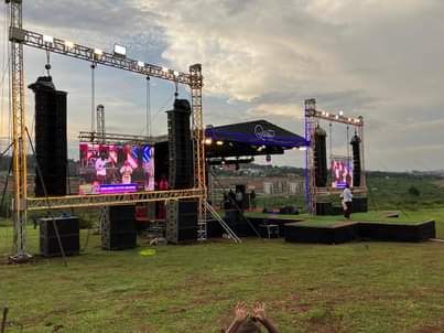 A picture of Stage PA system screens and lights
