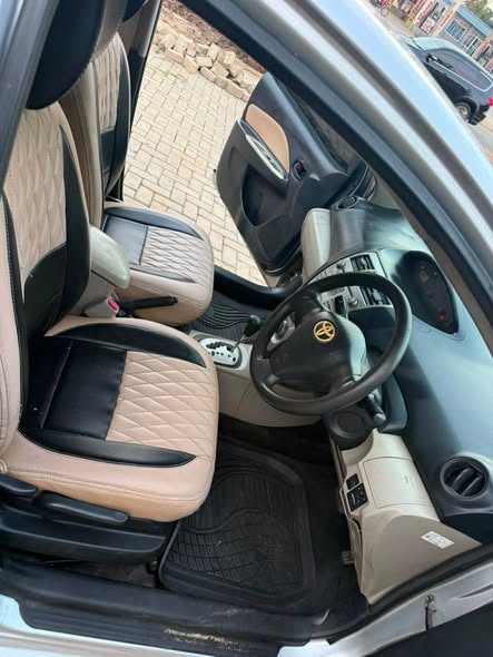 A picture of TOYOTA BELTA FULL AC MUSIC CC 1290 MIL 8 8