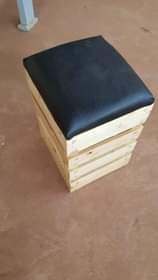A picture of Pallet ottoman with lather cushion
