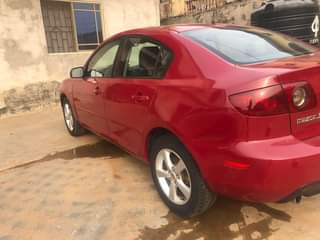 A picture of REGISTERED 2005 MAZDA 3 WHAT TO FIX AC LEAKAGE PAINTED