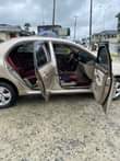 A picture of Toyota corolla 2006 Gold Colour blue Condition Nigerian Used pure