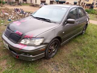 A picture of Lancer 2004 rally leather auto first body good engine and