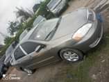 A picture of Very sharp 2004 model Toyota Corolla with sound Engine and