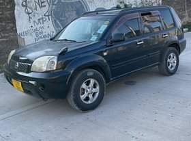 A picture of Nissan xtrail Dashboard kubwa Price mil 10.5 Full ac Clean