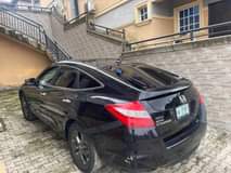 A picture of Super clean Honda crossour available for 3m Lagos fastest finger