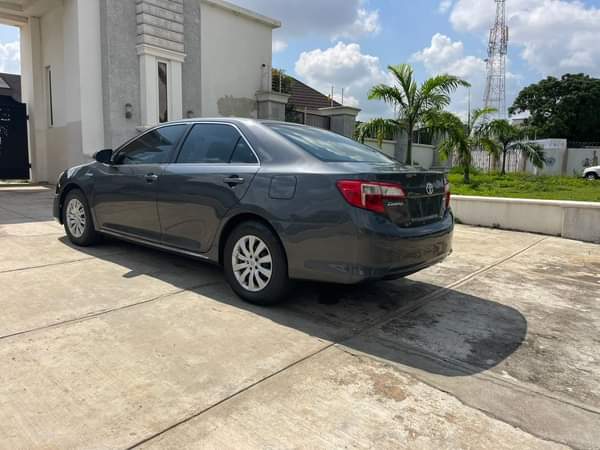 A picture of FOREIGN USED TOYOTA CAMRY 2013 MODEL KEYLESS HYBRID WITH DUTY