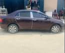 A picture of Total Corolla everything is perfect with Ac chilling Just buy