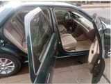 A picture of Toks green toyota camry tiny light extremly clean lagos cleared