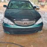 A picture of Toyota Camry 04 upgraded to 06 green color toks standard