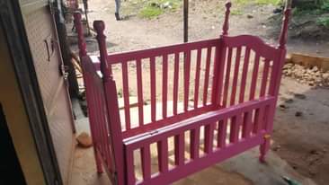 A picture of Baby crib in pink