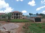 A picture of  Quick deal 340M_Ugx KAWEMPE_TULLA 4 in 1 Shell Apartments