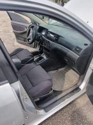 A picture of Toyota corolla obama manual gear Engine Gear and AC in