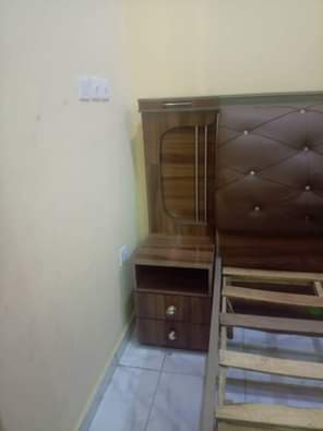 A picture of BEDFRAME DRESSING MIRROR 2 SIDE DRAWERS 250k RIGACHUKUN GRA KADUNA