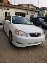 A picture of A foreign used white Corolla Sports very very clean and