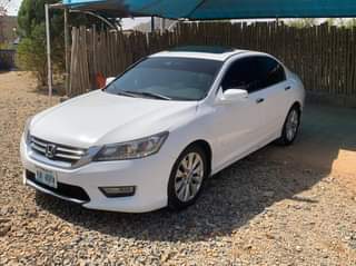 A picture of Distress sales Honda Accord full 2014model Full option keyless double