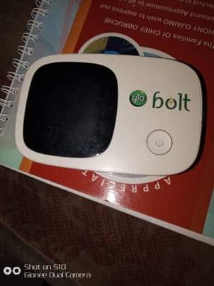 A picture of iPod iPhone and glo WiFi bolt