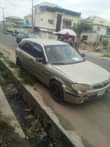 A picture of Mazda 323f automatic transmission everything perfect location Ibadan price 700