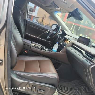 A picture of Rx350 2016 neatly used 2022 on custom