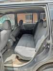 A picture of Awoof awoof Toyota Highlander year 2004 two rows painted going