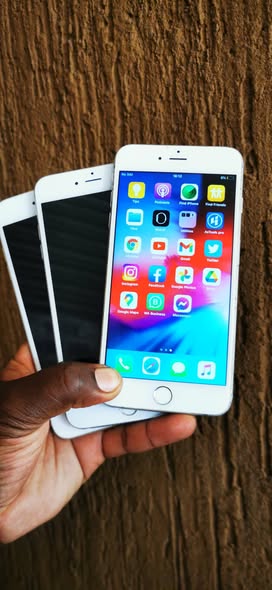 A picture of Iphone 6plus 100 000shs every application will work accept WhatsApp