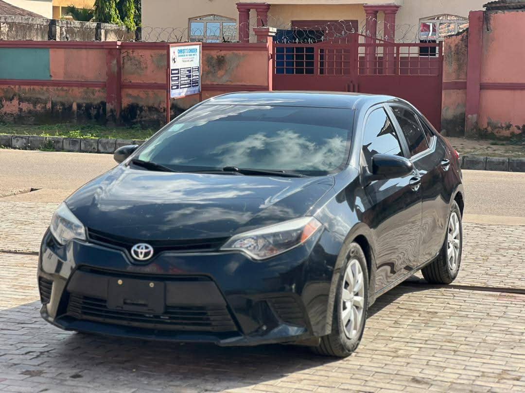A picture of EXTREMELY CLEAN TOYOTA COROLLA 2015 MODEL ORIGINAL CUSTOM DUTY TWO
