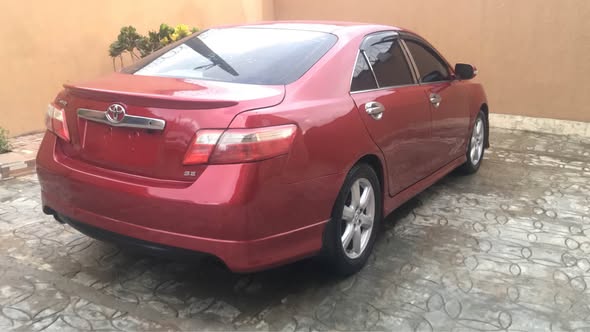 A picture of Very Sound Clean Red 2008 Registered Toyota Camry Sport Up
