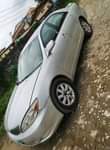 A picture of Toyota Camry 2004 4 plug Painted on first body Clean