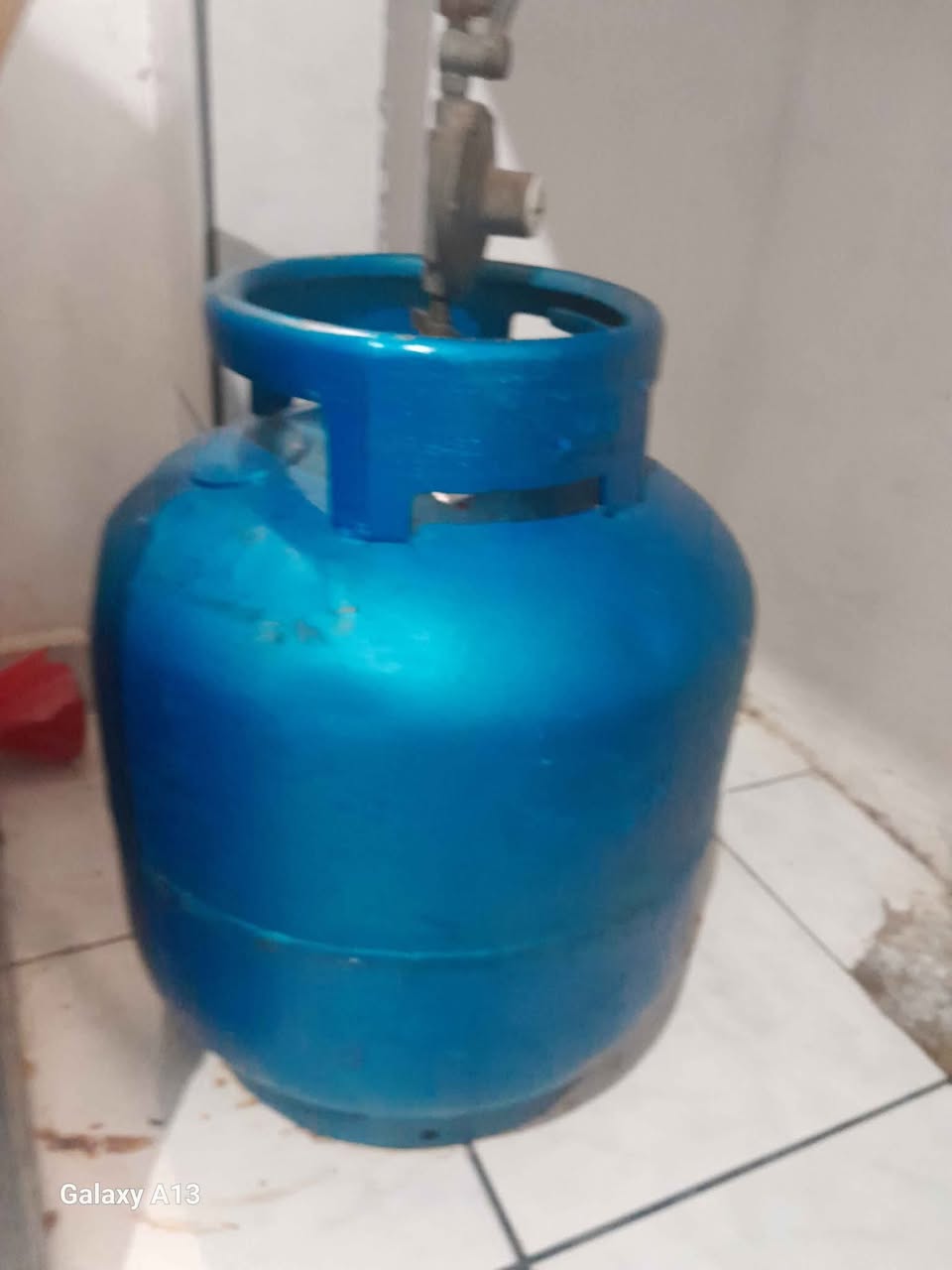 A picture of Botijao de gas com mangera