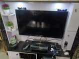 A picture of Few month used tv stand