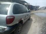 A picture of Dodge caravan 02 engine and gear working well but needs