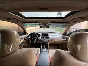 A picture of USED HONDA ACCORD WINE 2009 MODEL WITH SUNROOF AT KADUNA